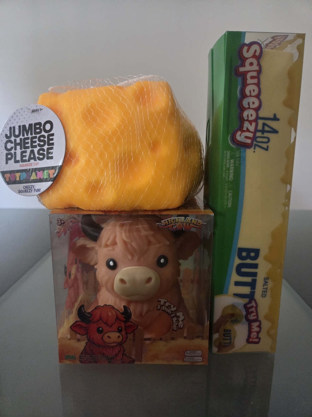 (3 Squishies) 1 Highland Cow, 1 Jumbo Cheese Please and 1 14oz Squeeezy Butter.